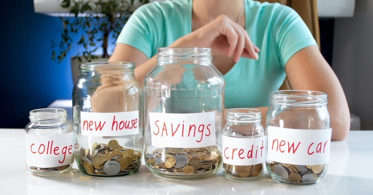 woman thinking of managing her money savings