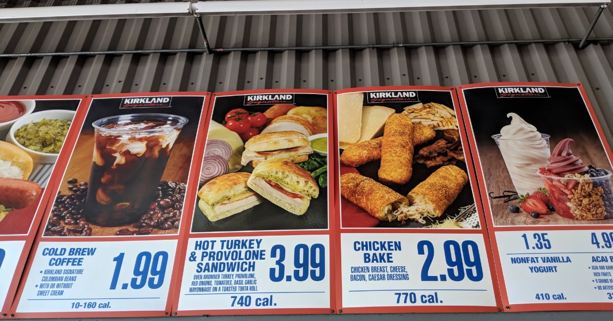 costco food court menu with various dishes on paper at table
