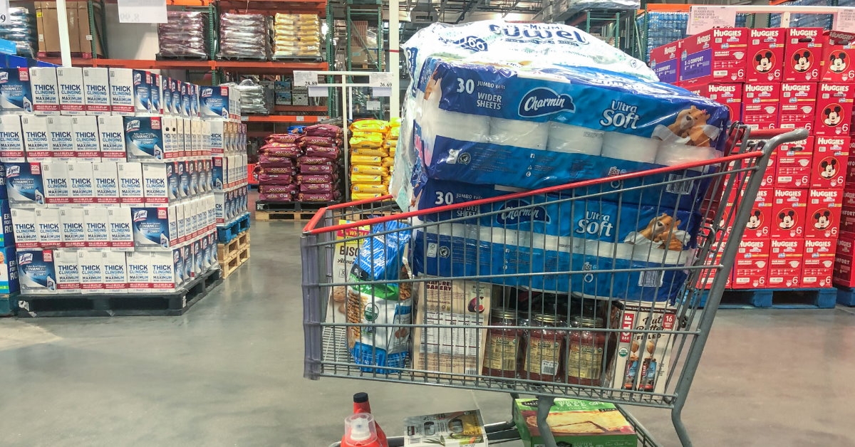 grocery cart inside kalamazoo costco store full of supplies and toilet papers