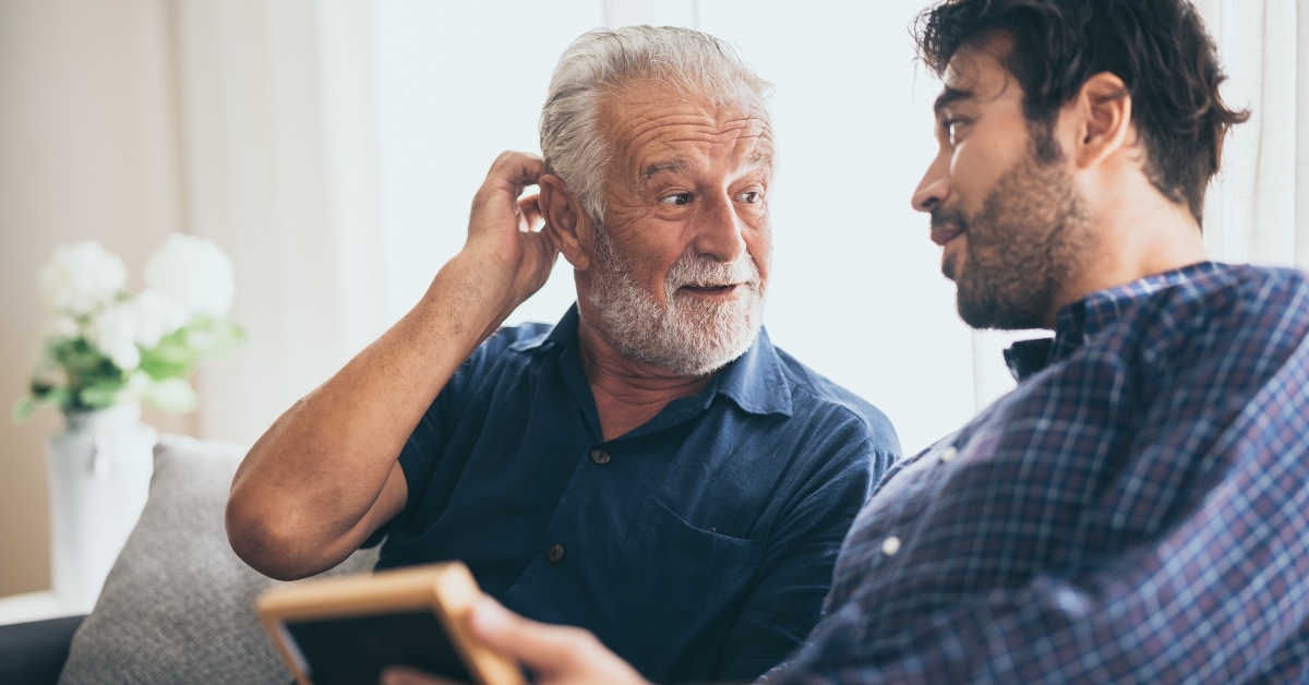 adult hipster son and old senior father