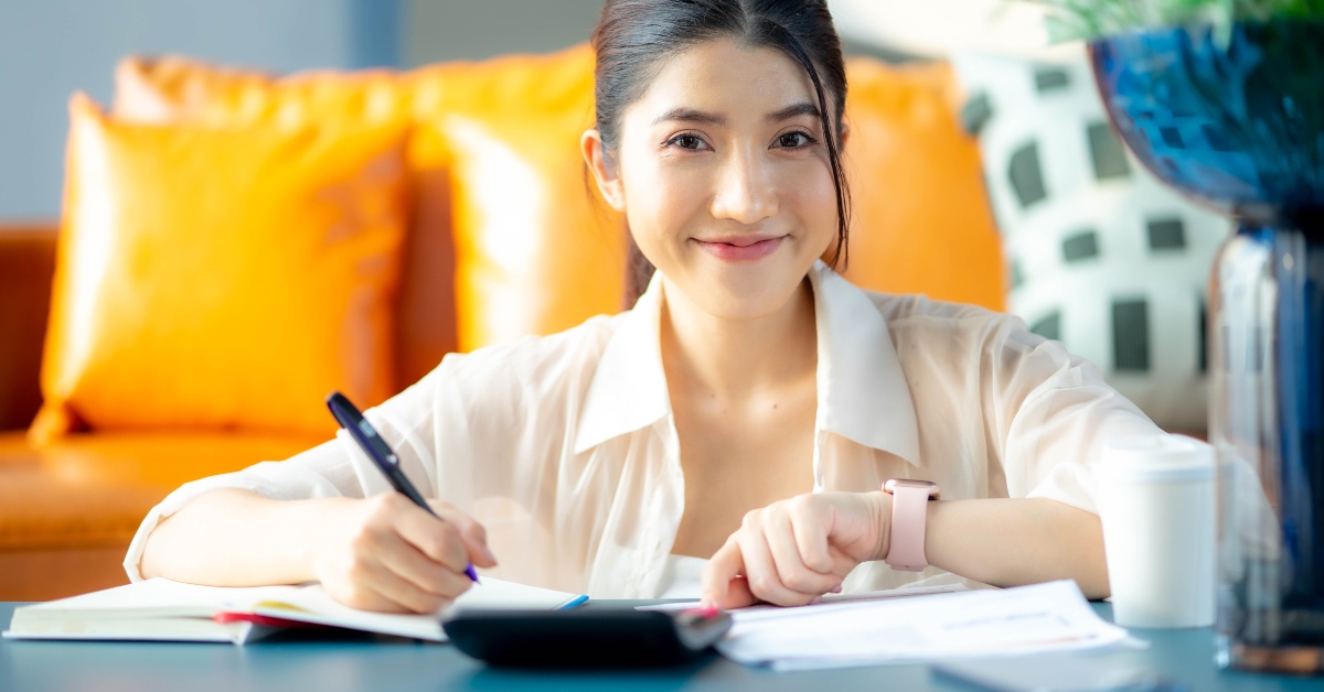 woman looking pleased and happy in e-banking