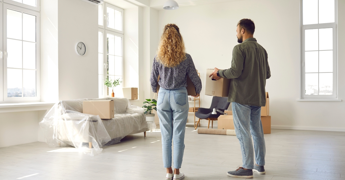 young married couple settling down in new place