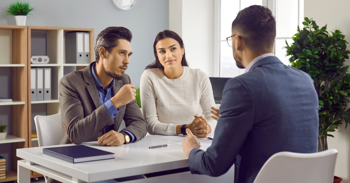 couple meeting with loan broker