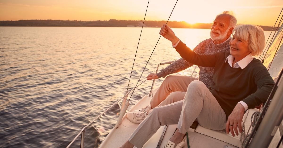 senior couple in a sailboat