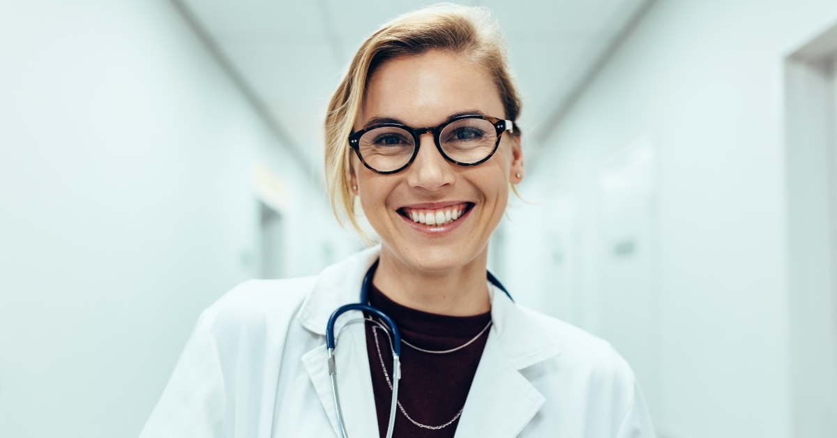 female doctor standing in hospital corridor