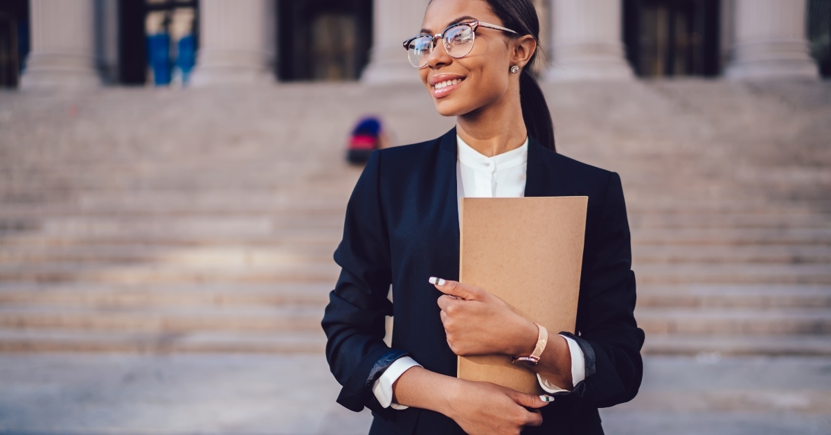 juridical specialist standing outdoors 