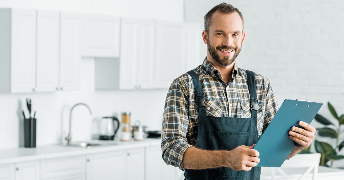 plumber holding clipboard