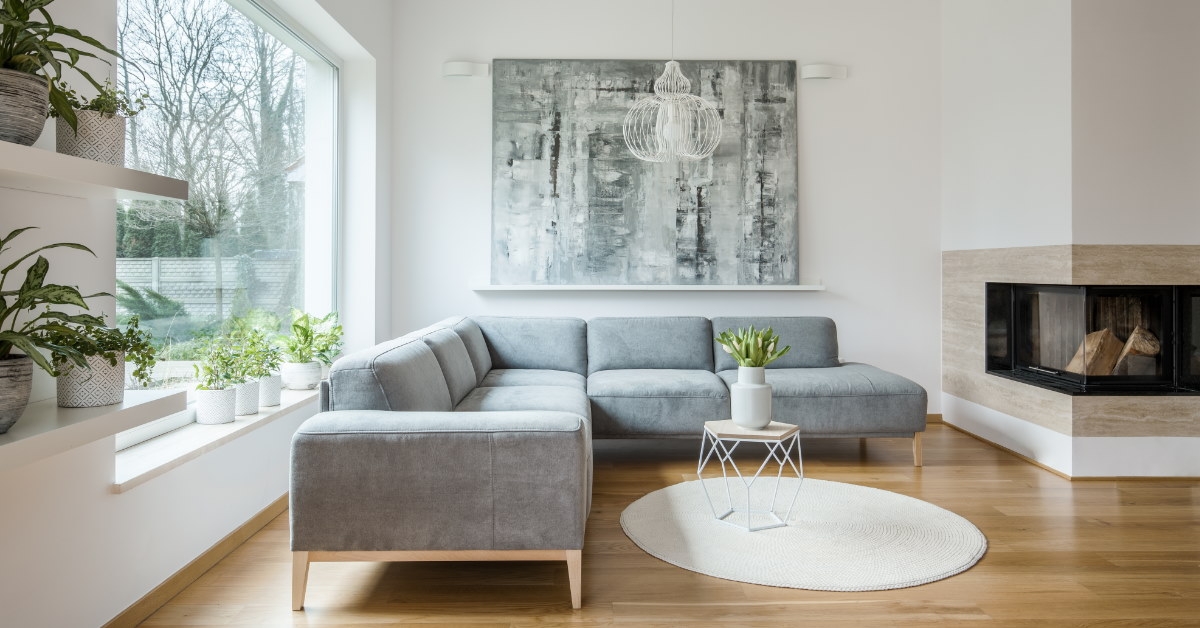couch and white centerpiece in spacious living room