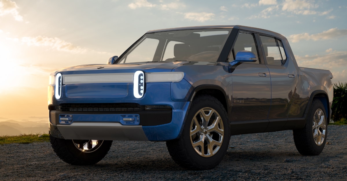 rivian electric adventure vehichle at beach