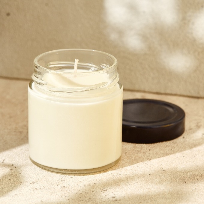 aromatic burning candle in jar