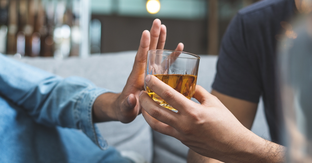 man refuses to drink alcohol