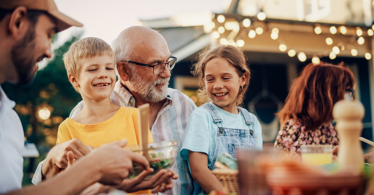 grandfather talking and having fun with his grandchildren