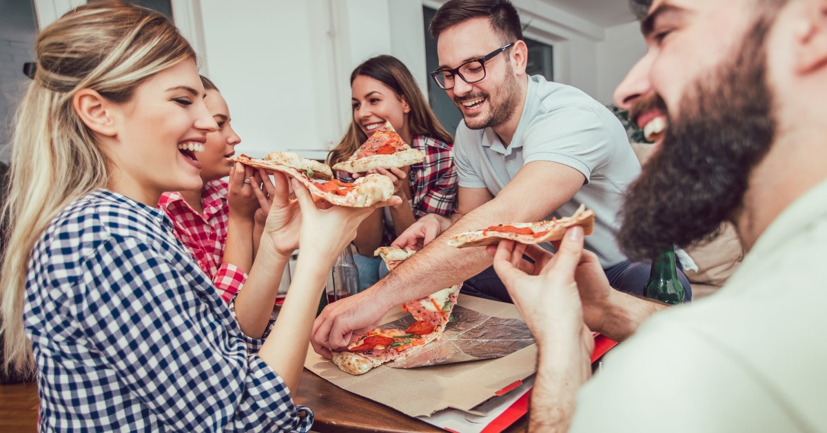 friends having pizza together