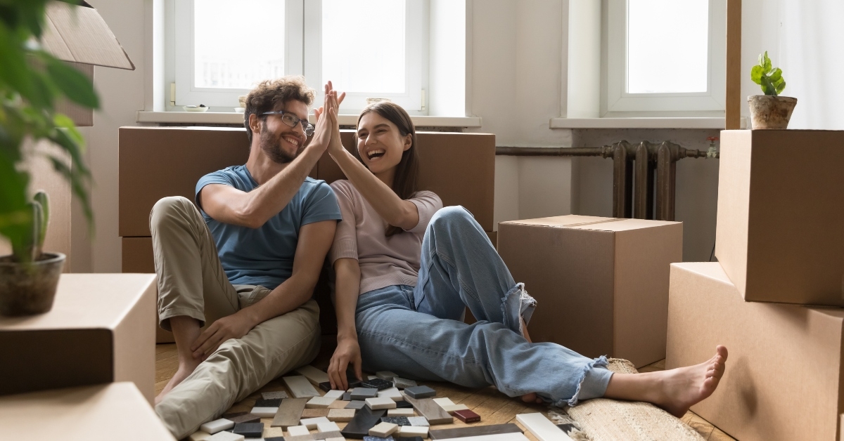 young couple moving into new apartment
