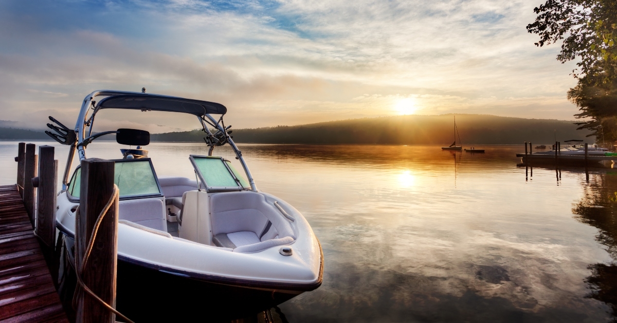 sun and mist on boat dock at sunrise