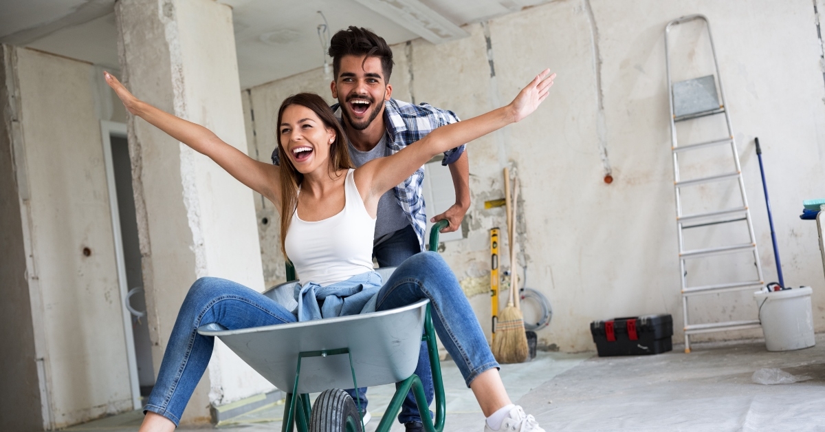 loving couple is having fun while they are renovating house