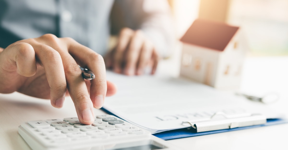 man calculating house loans