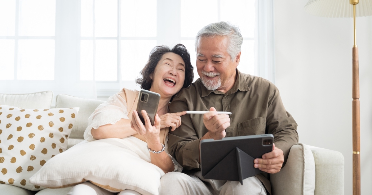 senior couple in living room at home