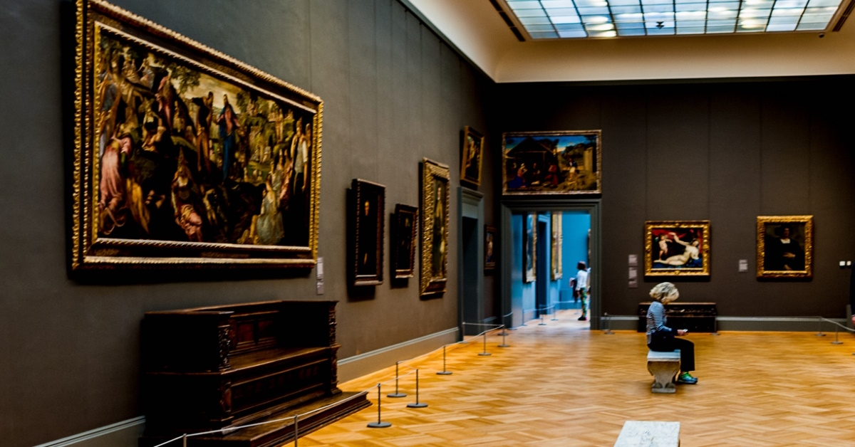paintings at display inside the metropolitan museum of art with visitors 