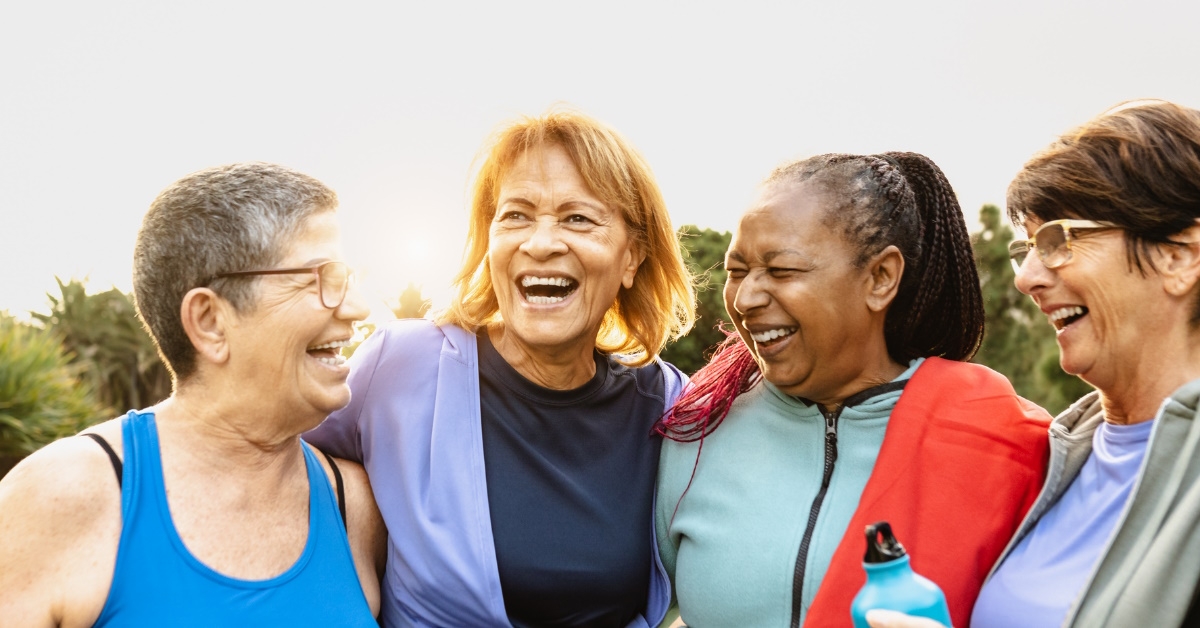 multi ethnic friends meeting in outdoor park working out together during day time