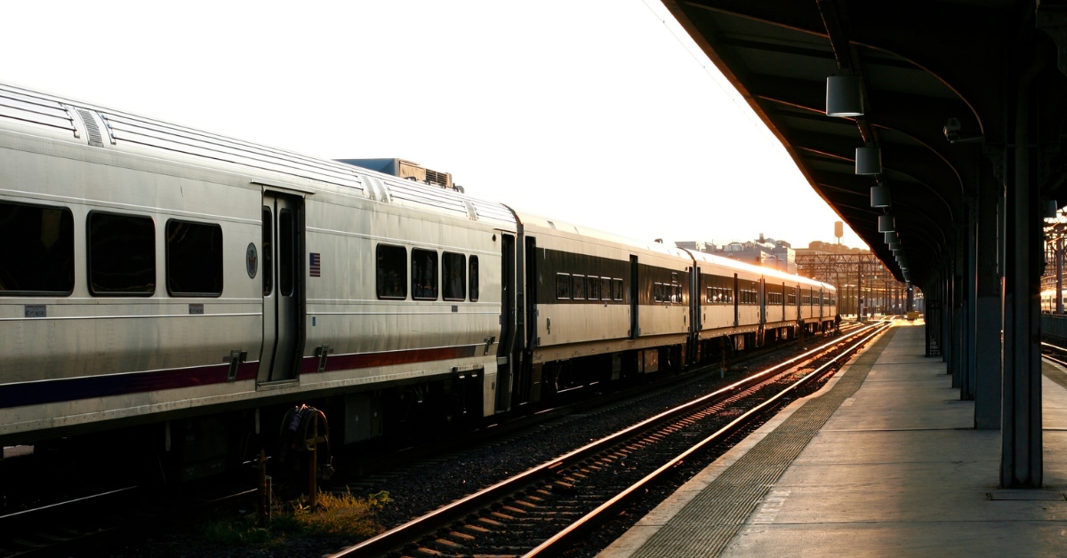 train waiting for commuters to get on board at vacant train station during day time