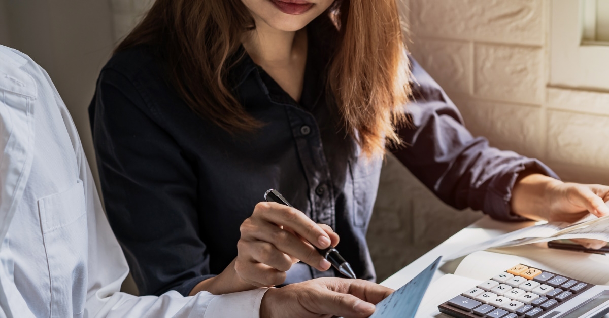 couple reviewing monthly budget