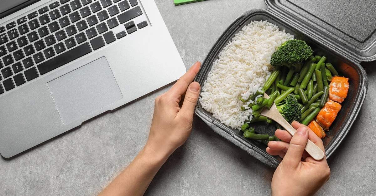 woman eating natural protein food from container