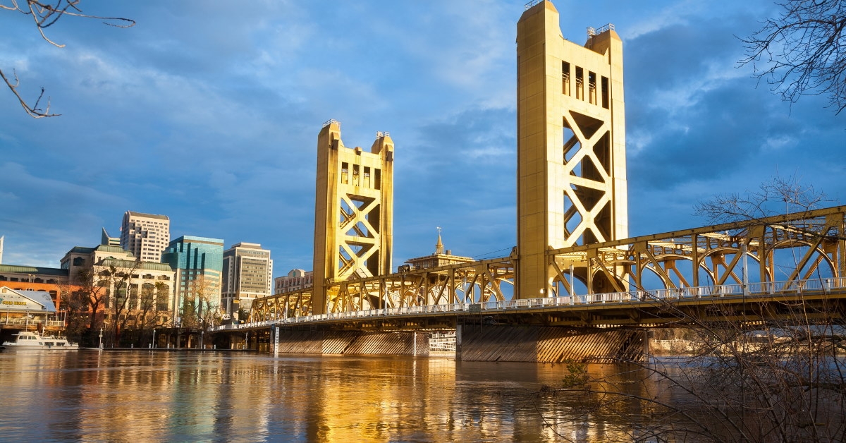 old sacramento bridge on river during day time 