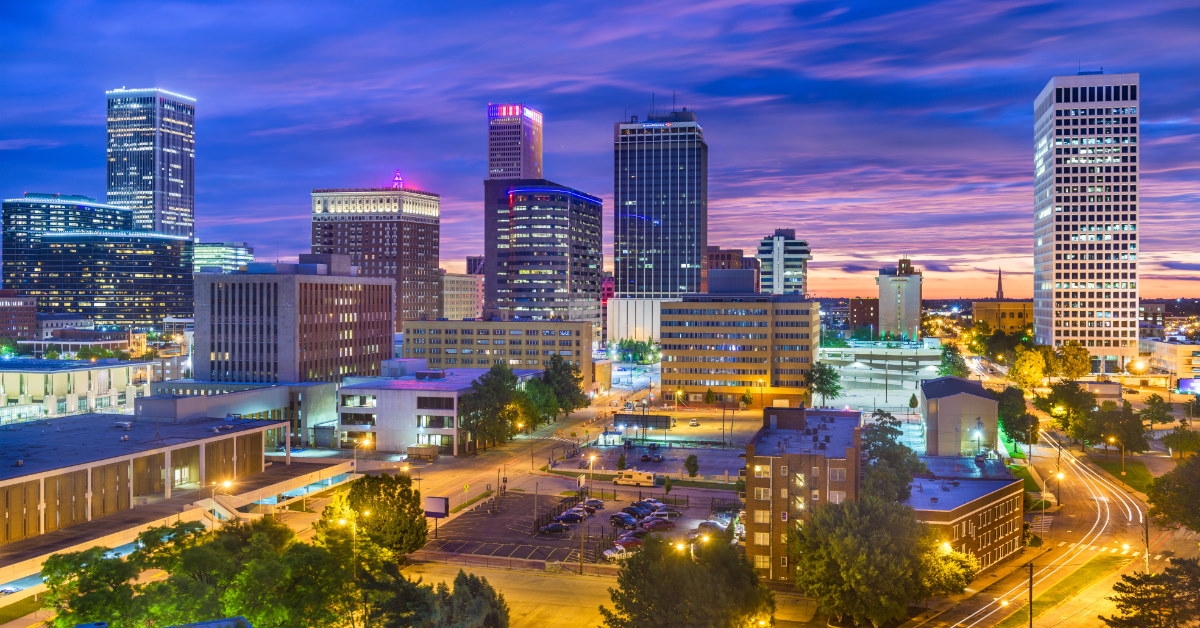 tulsa oklahoma skyscraper with beautiful bright lights at night