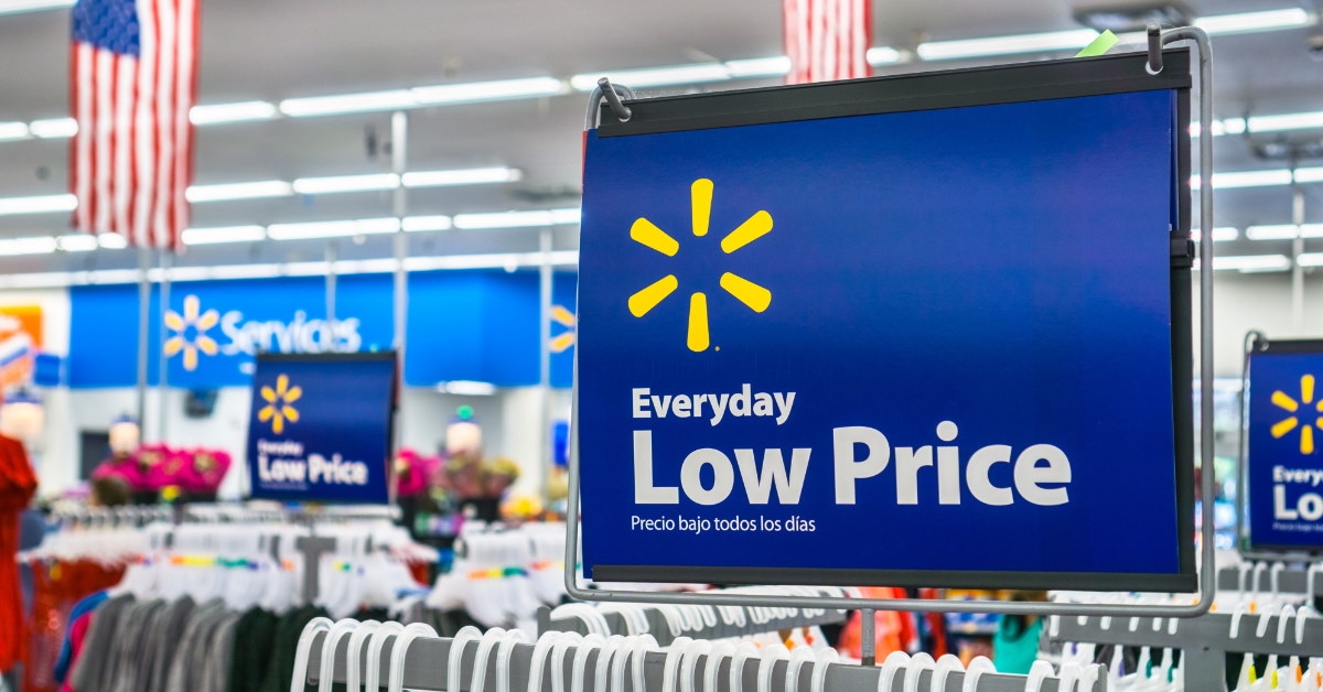 low price signs in walmart's clothing aisle