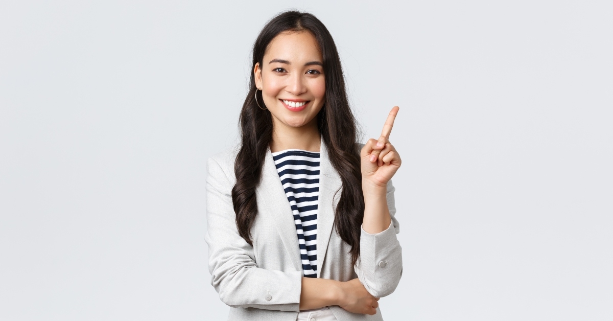 asian real estate broker pointing finger
