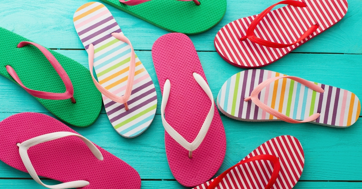 flip flops on blue wooden floor