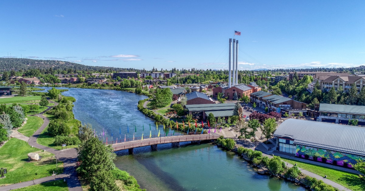 old mill district besides deschutes river in oregon during day time