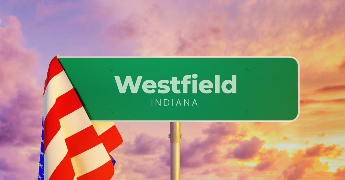 westfield sign board on road besides orange sky