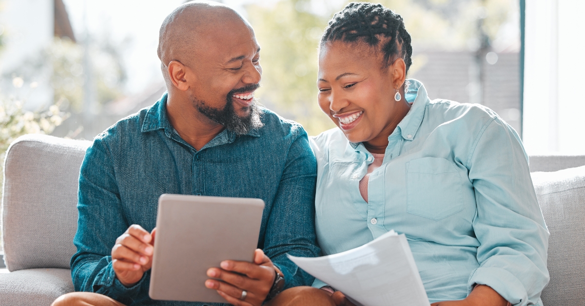 mature couple using a digital tablet together