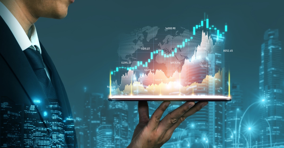 man wearing suit holding graphs showing concept of digital financing