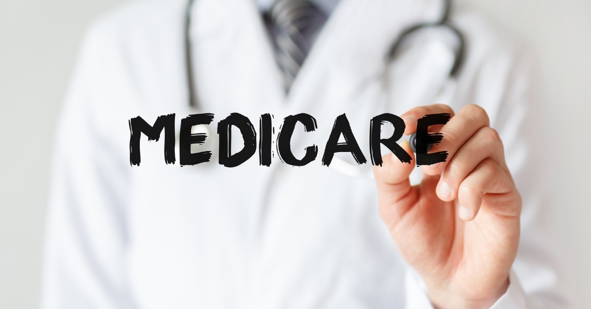 doctor writing medicare with black marker on mirror