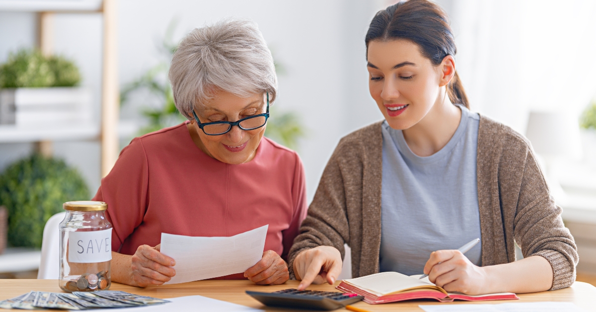 women calculating family budget 
