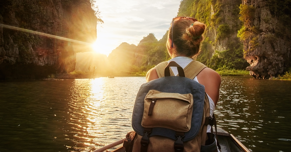 Woman canoeing on beautiful river