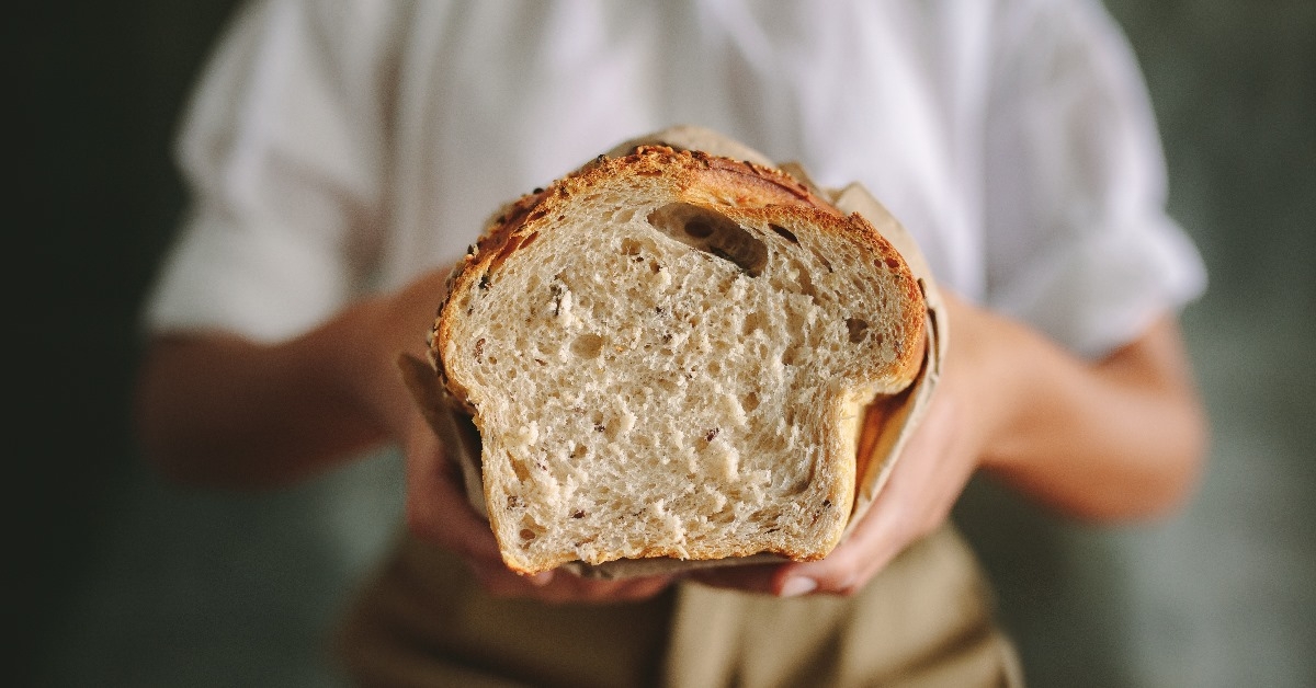 female baker with fresh bread