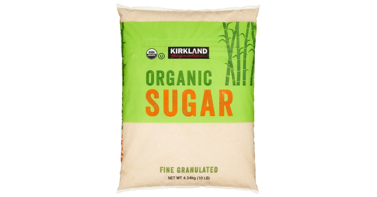 pack of organic and fine granulated sugar from kirkland signature over white background