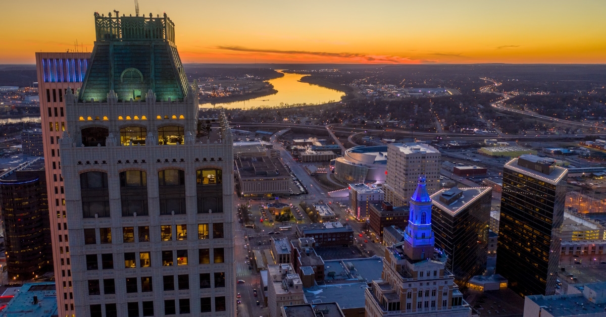 skyscrapers with golden lights and small buildings in tulsa at sunset