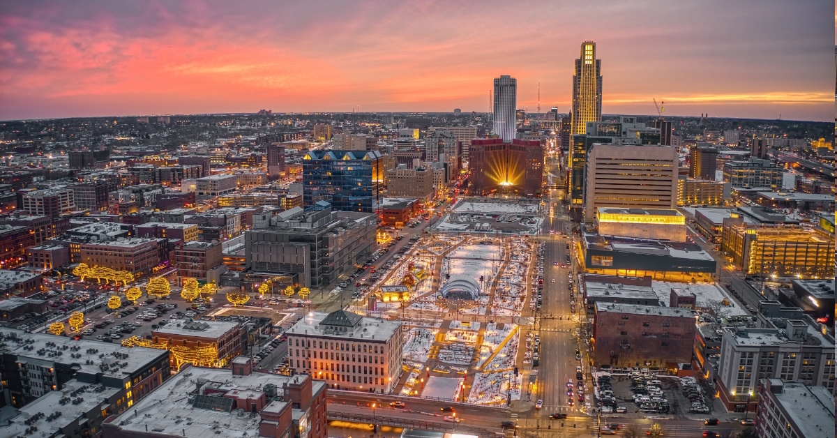 skyscrapers in omaha nebraska with holiday lights at sunset