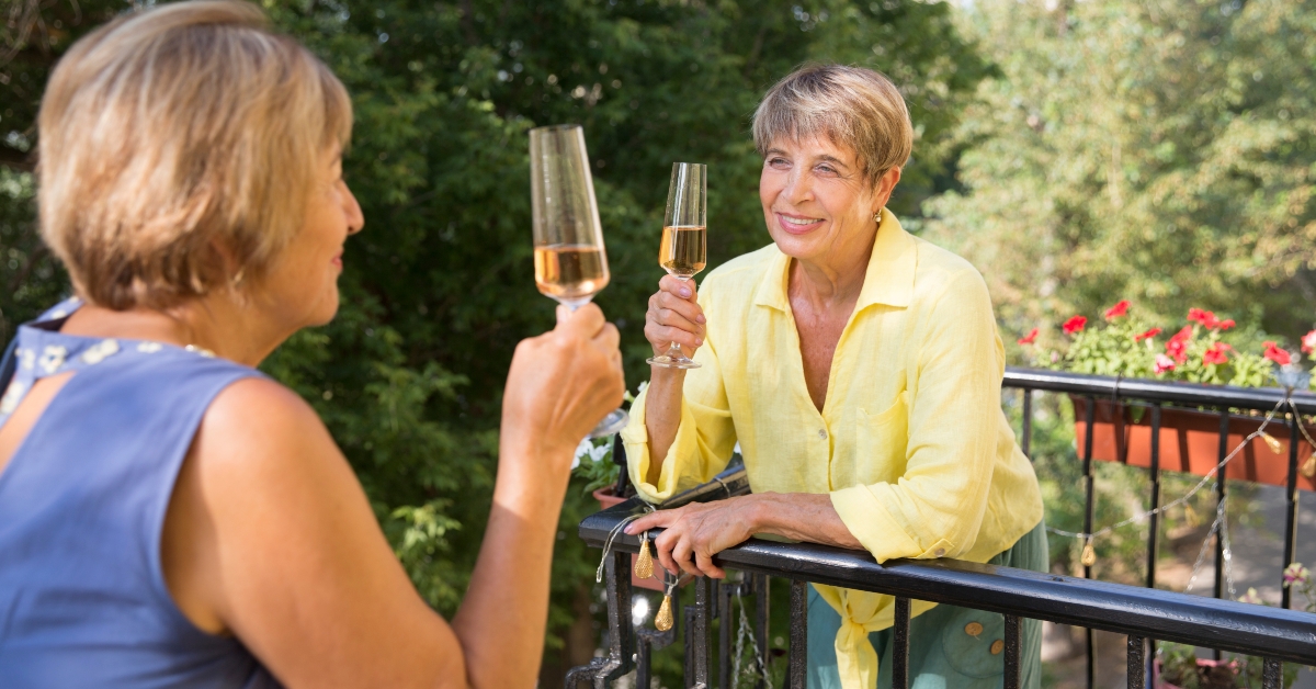 happy senior woman neighbors friend chatting