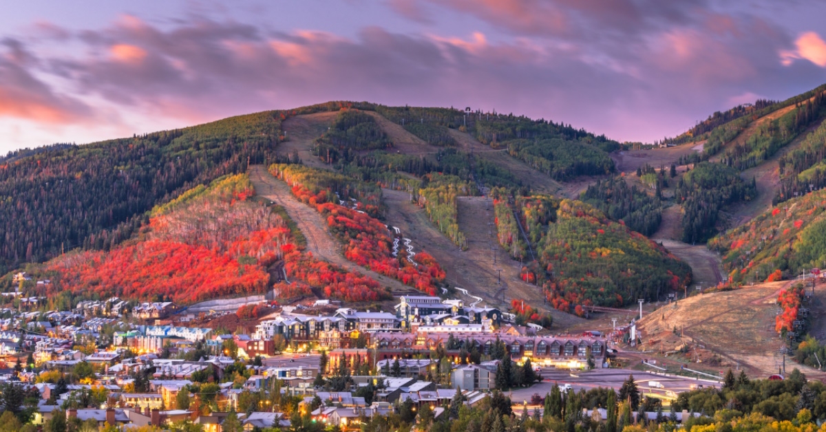 aerial view of utah countryside houses under a purple sky.