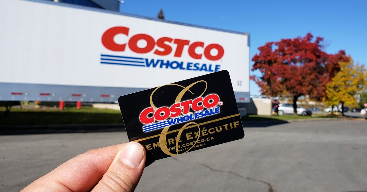 holding costco membership card 