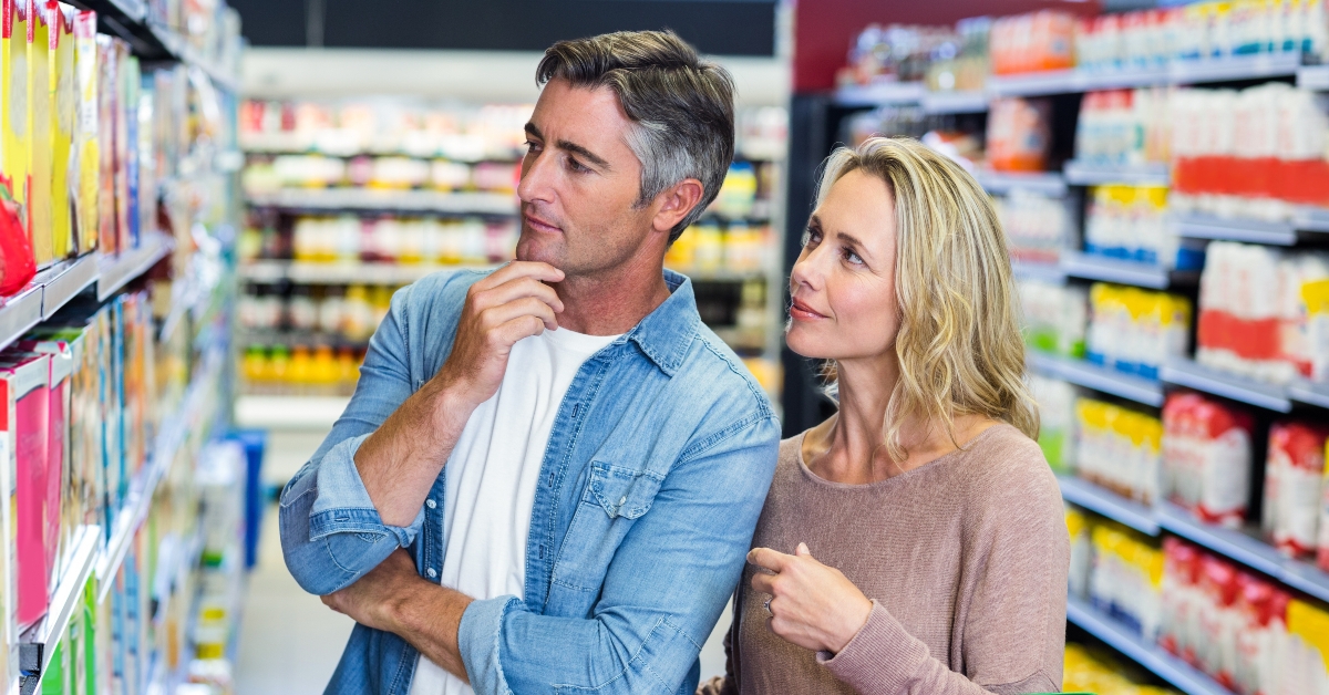thoughtful couple choosing a product