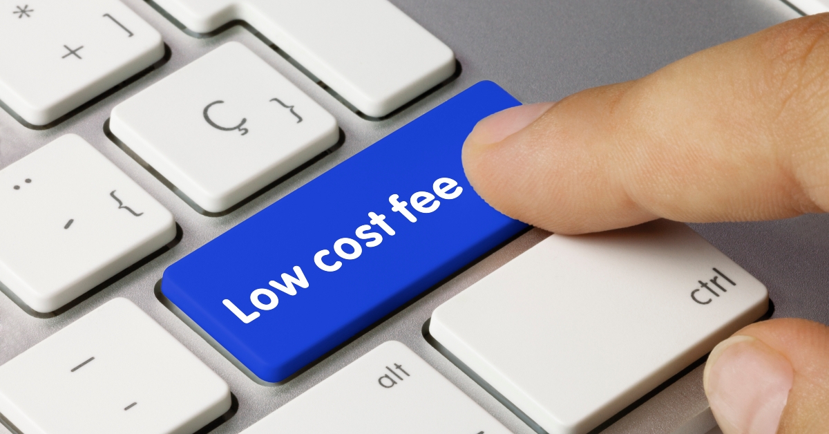 low cost fee - inscription on blue keyboard key.