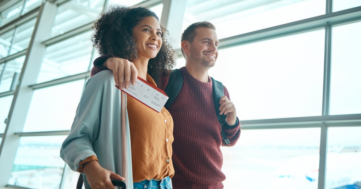 couple with ticket for international flight
