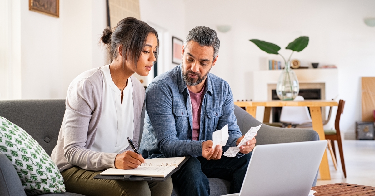 mid adult couple working on home finance